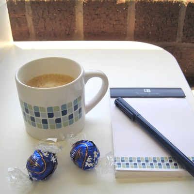 I'll make you a Nespresso latte. I always keep chocolates on hand for emergencies.